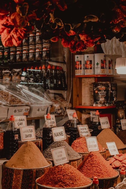 Colorful spices displayed at a traditional Turkish spice market bazaar